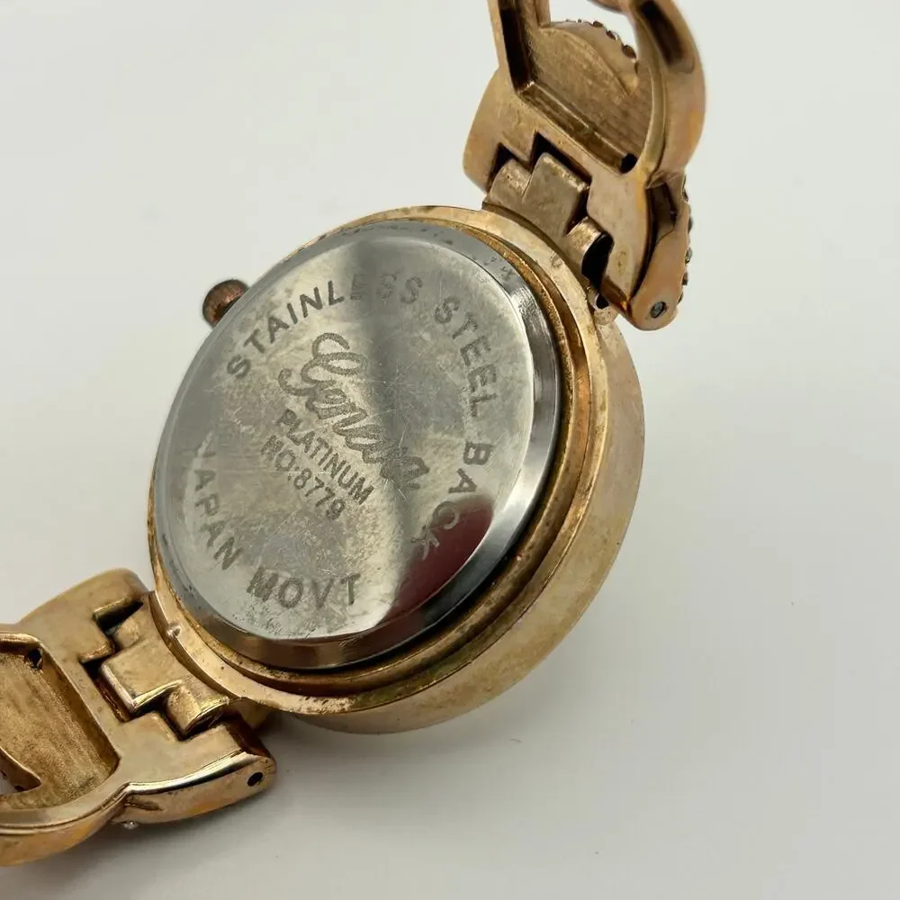 Geneva Platinum Women's Rose Gold Tone Crystal Accents Cuff Band Watch